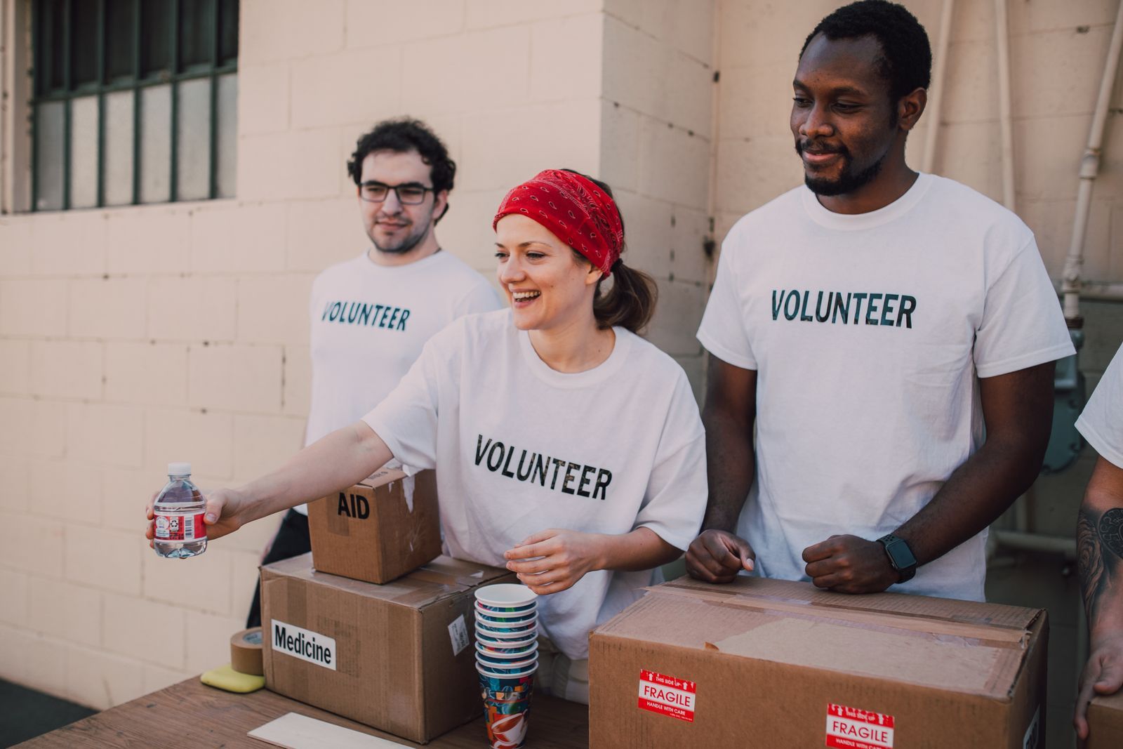 Volunteers handing out supplies